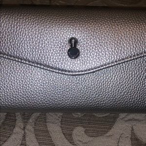 London fog Silver clutch and sunglass case!